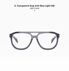 Detail of transparent grey pilot frame glasses with double bridge and gold metal accents