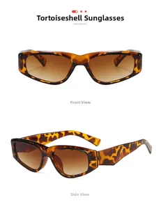 Detail of vintage cat eye sunglasses with tortoise pattern frames and brown gradient lenses