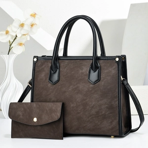 Retro dark brown textured tote bag with matching envelope pouch and black handle accents