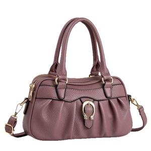 Elegant purple lychee leather handbag with pleated detail and gold horseshoe buckle