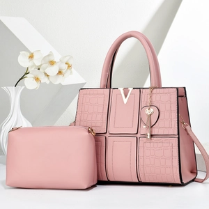Pink two-piece tote bag set with crocodile pattern stitching and golden V-shaped metal hardware