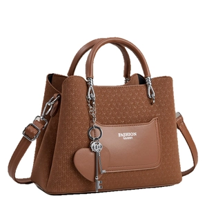 Brown woven texture handbag with double handles and a detachable shoulder strap on white back