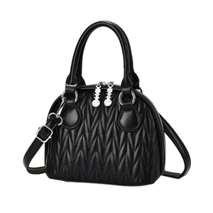 Large black chevron quilted shell handbag with silver hardware and shoulder strap