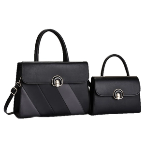 Fashionable black striped large capacity shoulder bag set with metallic twist lock detail