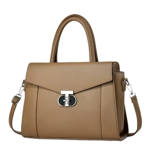 Brown lychee grain leather handbag with silver metal buckle and top handle for women