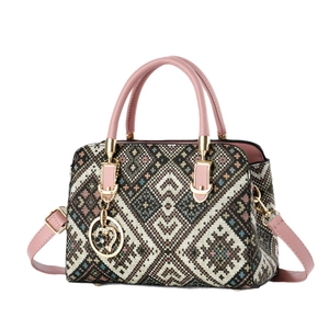 Ethnic geometric pattern Boston handbag for women with pink leather straps and heart charm