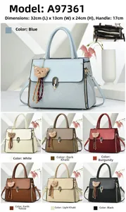 Detail view of large PU leather tote bag with bear charm and size dimensions info