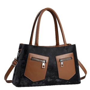 Vintage two-tone tote bag in black and brown with silver zippers and adjustable strap