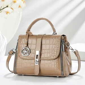 Khaki glossy faux crocodile handbag with clover pendant and silver metallic hardware