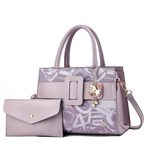 Purple leather tote bag set with monogram print and metal shell charm for women