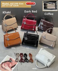 Detailed flat lay of patent crocodile textured handbags in seven stylish colors