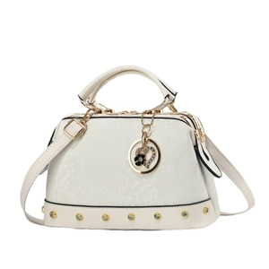 Beige faux snake leather handbag with gold heart pendant and detachable shoulder strap