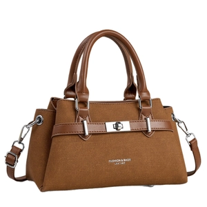 Brown fabric handbag with leather trim, silver twist lock and detachable shoulder strap