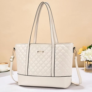 Elegant cream quilted tote bag with dual handles and metal detail for women