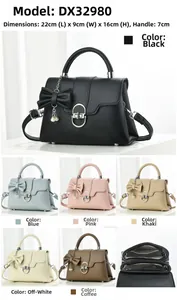 Detail view of the 22x9x16cm leather handbag showing six available colors and pearl charm