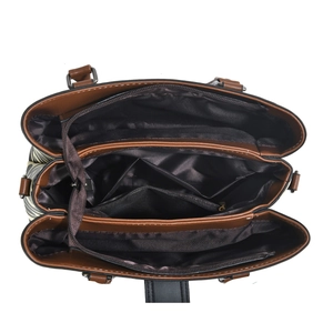 Detail view of large capacity interior compartments and secure zippers for handbag