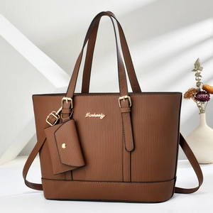 Brown herringbone textured tote bag with detachable mini purse and gold hardware