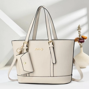 Close-up of beige woven texture tote bag with Danbaoly gold logo and small pouch