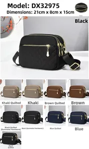 Detail view of multi-compartment nylon crossbody bag showing 21x15x8cm size dimensions