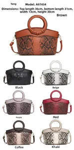 Detailed view of large capacity faux snake skin and leather tote bags in seven colors