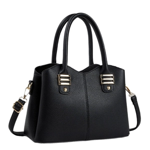 Classic black litchi pattern leather handbag with gold metal accents and shoulder strap