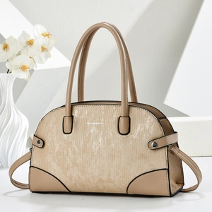 Chic beige textured fabric underarm bag with smooth leather trim and adjustable strap