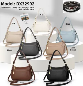 Vue détaillée du sac femme dimensions 27x11x19cm avec agencement multi-compartiments