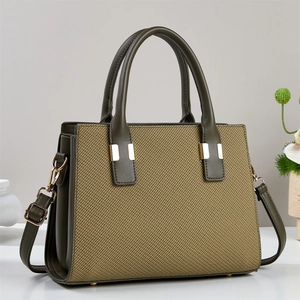 Retro olive green and khaki woven tote bag with adjustable shoulder strap and gold hardware