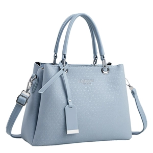 Light blue woven texture handbag with detachable shoulder strap and silver lettering