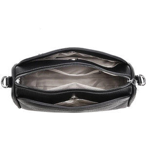 Top view of pebble leather handbag with triple compartments and herringbone lining