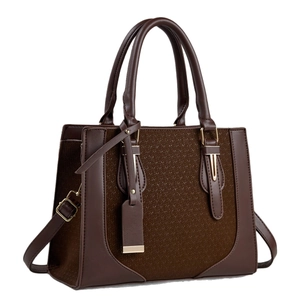 Dark brown women's handbag with herringbone pattern panel and gold hardware