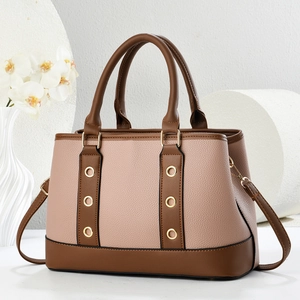 Two-tone leather tote bag with lychee texture and gold eyelet details for women