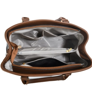 Top view of handbag interior showing multiple compartments and gray herringbone lining
