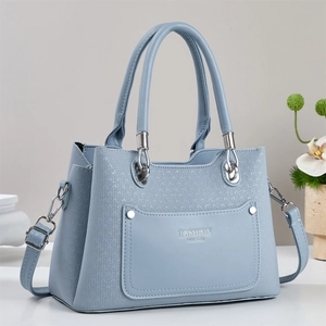 Light blue woven texture tote bag with Fashion Queen lettering and crossbody strap