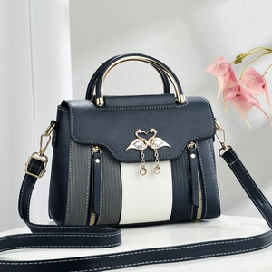 Elegant retro small square bag in blue-grey patchwork with flamingo buckle and metal handle