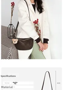 Detail of a dark brown PU shoulder bag with bear pendant and 46cm strap height