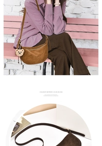 Brown suede hobo bag with adjustable strap and cute plush bear charm detail