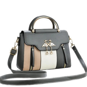 Vintage colorblock small crossbody handbag with golden swan clasp and pearl tassel detail