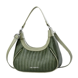 Dark green crescent shoulder bag with V-shaped woven texture and silver hardware details