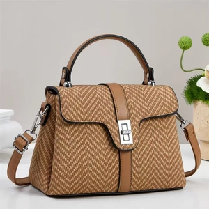 Classic beige herringbone woven square bag with brown leather trim and metal lock closure