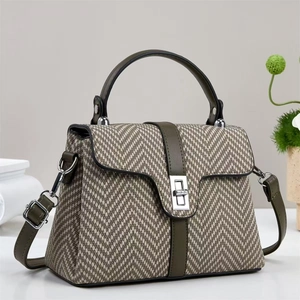 Gray herringbone pattern handbag with olive green trim and silver turn-lock hardware