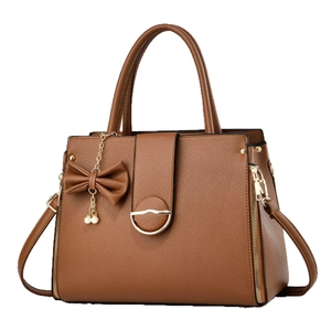 Brown large-capacity tote bag with pearl bow charm and adjustable shoulder strap