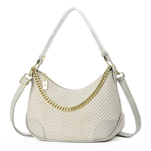 Beige woven hobo bag with leather trim and gold chain strap shown on white background
