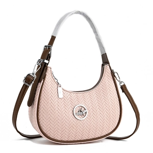 Pink woven half-moon crossbody bag with silver bird logo and brown leather handle
