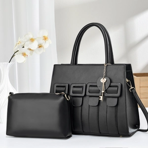 Elegant black leather woven tote bag set with golden key pendant and matching pouch