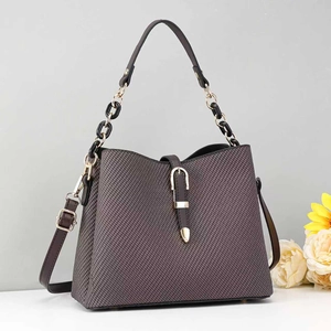 Brown woven tote bag for women with gold chain handle and adjustable shoulder strap