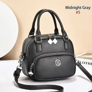 Midnight gray pebbled PU leather round handbag with clover zippers and silver M logo