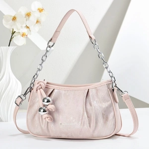Chic light pink pleated cloud bag with silver chain and leather straps on white display