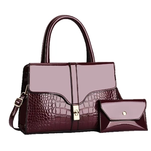 Burgundy faux crocodile leather handbag with matching wallet and gold hardware