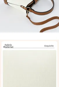 Detailed view of the white woven fabric texture with brown leather straps and gold hardware